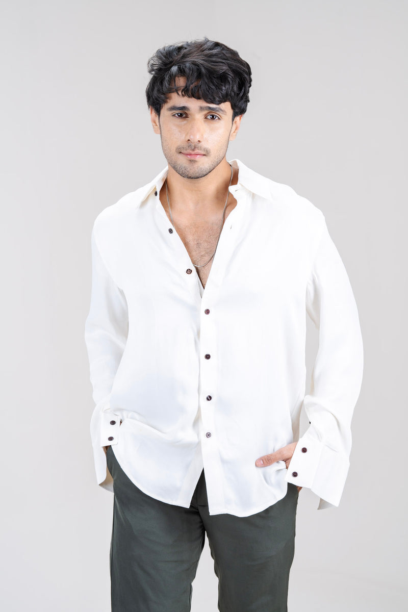 Mula Shvet white shirt in orange-peel fabric, front view with grey trousers