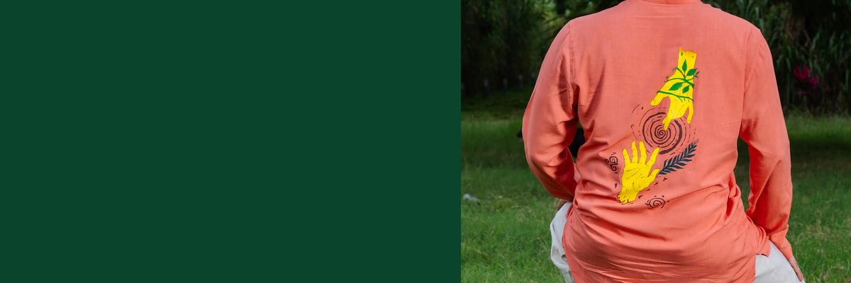 Back of the coral Brahmand kurta, hand-painted with two hands and a spiral